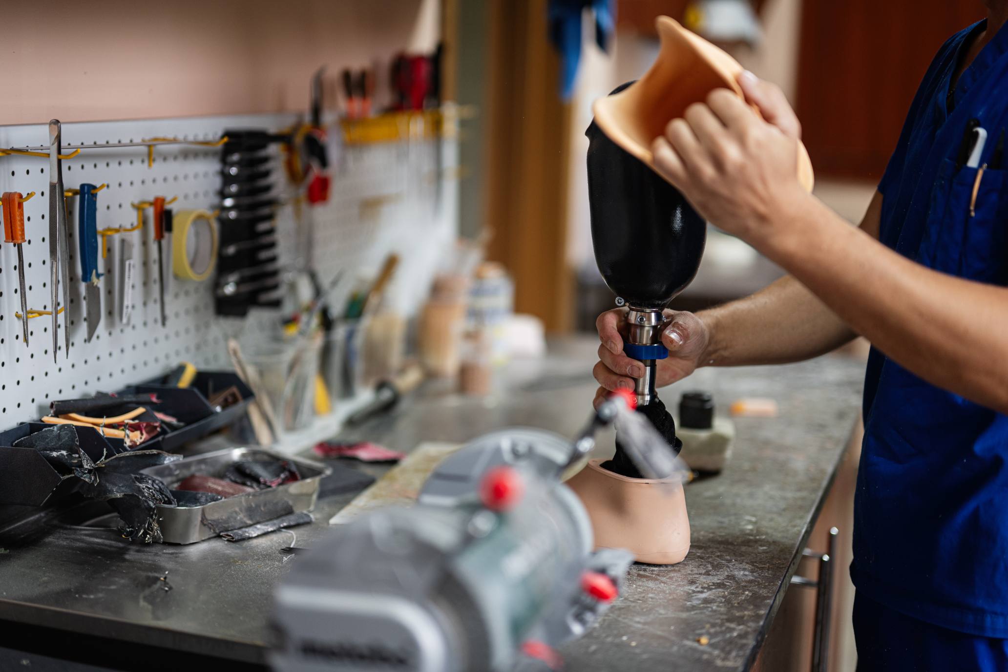 technician assembling prosthetic leg in a workshop 2025 02 11 15 18 40 utc (1)